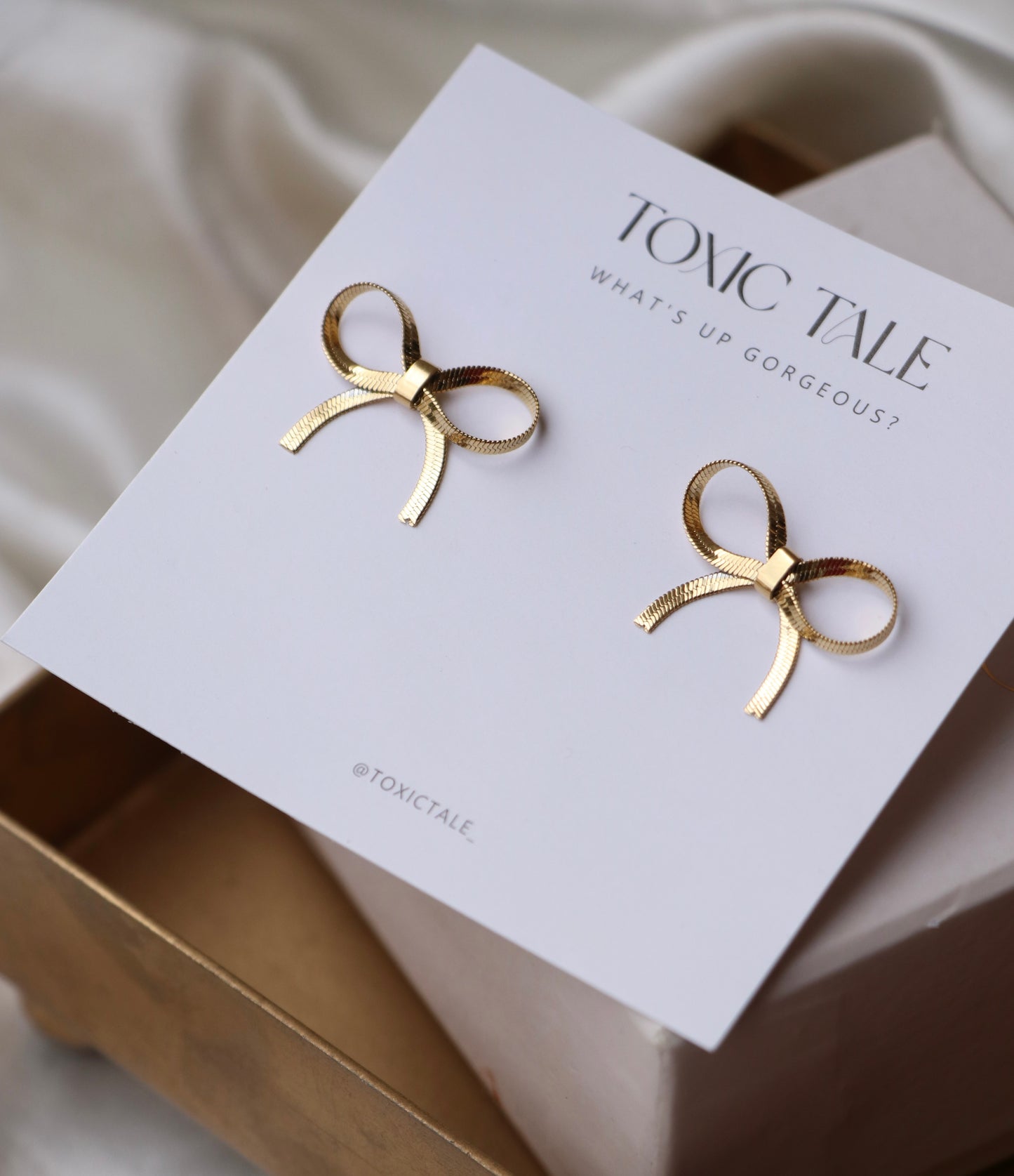 Tira Bow Studs