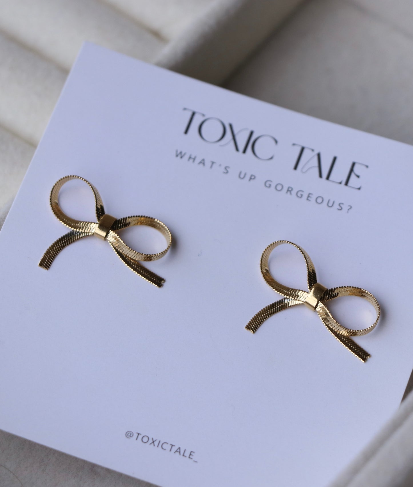 Tira Bow Studs