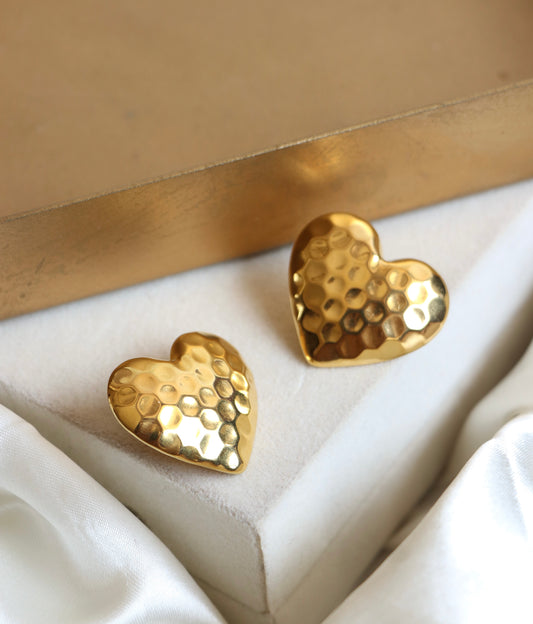 Heart’s dented studs