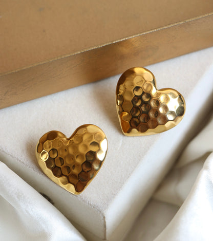 Heart’s dented studs