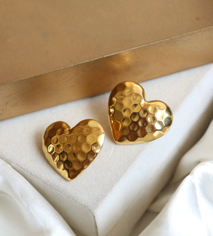 Heart’s dented studs