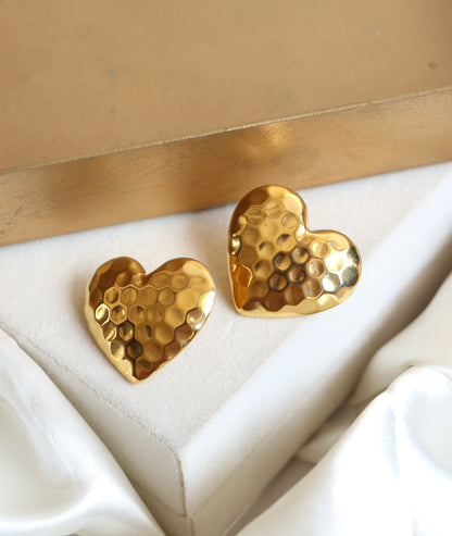 Heart’s dented studs